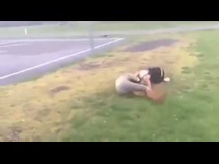 brunettes scrap in foggy field